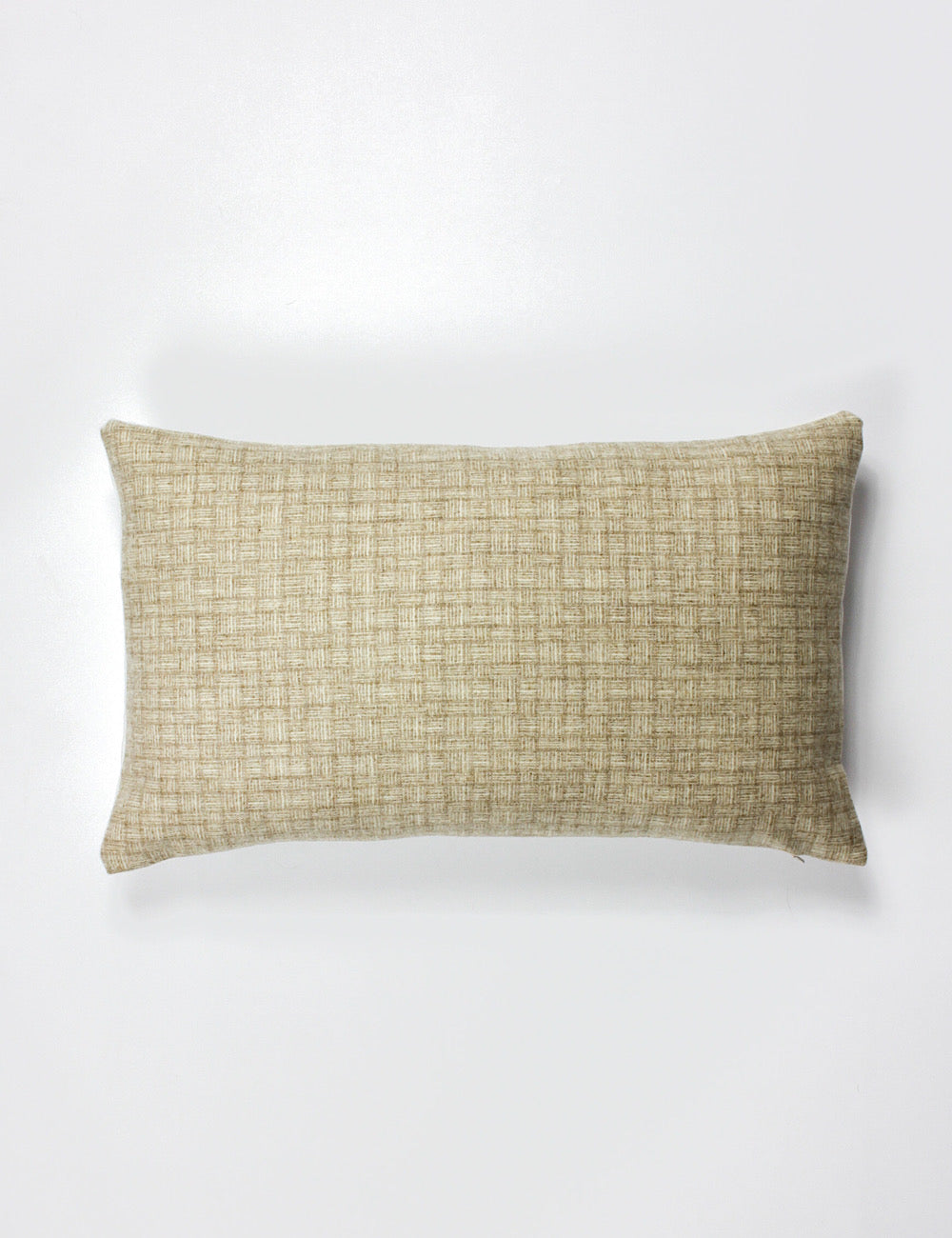 Lumbar scatter cushion cover with a neutral colour and subtle small scale woven pattern going across. 