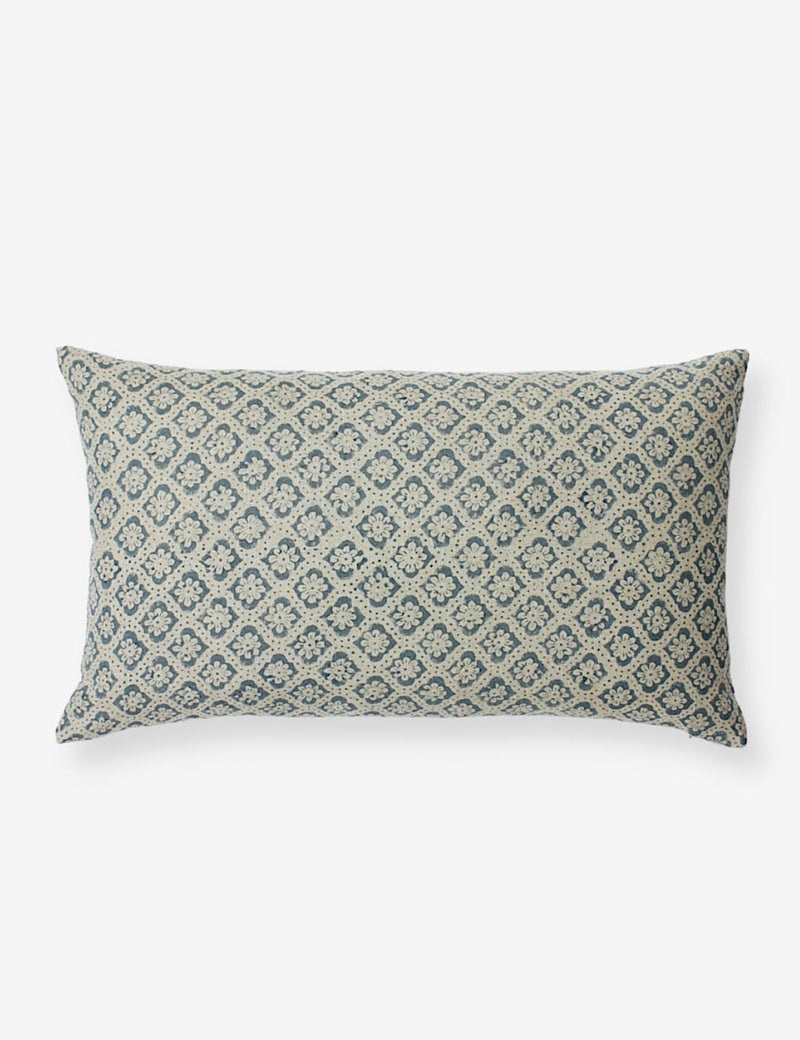 Lumbar blue cushion cover with an intricate floral block print pattern running across.