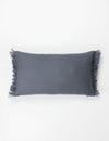 lumbar cushion in blue with fringe detailing on either side. 100% linen.